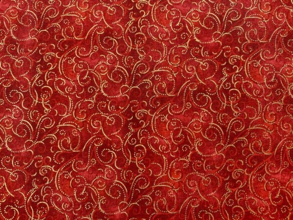 Patchwork stof - rød med guld mønster