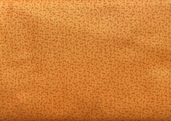 Patchwork stof - gulorange med lille mønster
