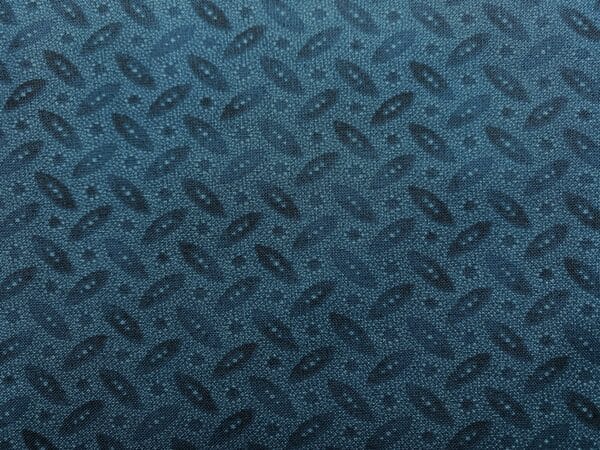 Patchwork stof - petrolblå med mønster