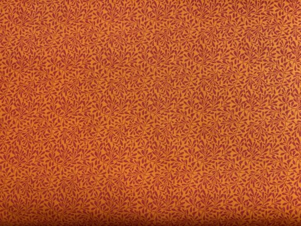 Patchwork stof - orange med bladmønster