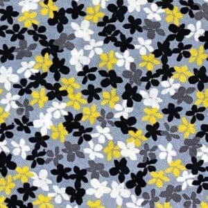 Patchwork stof - lyseblå med gule, hvide og sorte blomster