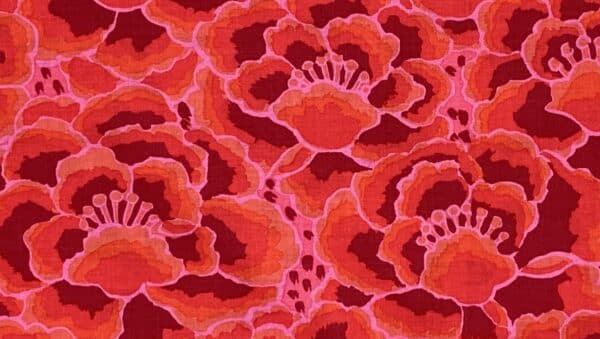 Patchwork stof - blomster i røde nuancer