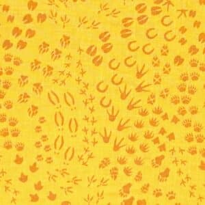 Patchwork stof - gult stof med dyrespor