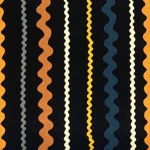 Patchwork stof - sort baggrund med farvede bølger