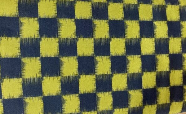 Patchwork stof - gule og sorte firkanter