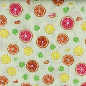 Patchwork stof - Citron og appelsinskiver på lys lime bund