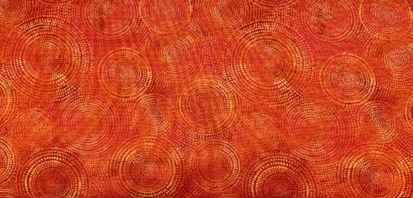Patchwork stof - Orange med lidt gult i prikkede ringe