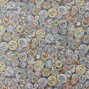 Patchwork stof -Pastelfarvede knapper på grå baggrund