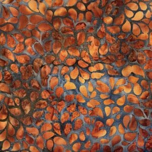 Patchwork stof - Blågrå med orange gyldne ovaler. Batik